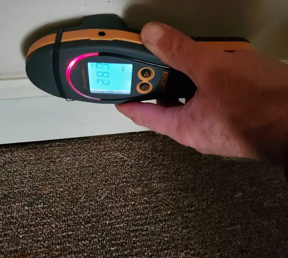 Moisture detection at baseboard during Burst Pipe Cleanup in Mableton